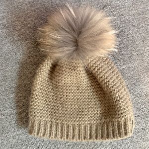 RUDSAK raccoon fur toque
